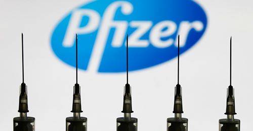 Pfizer vaccine rolls off production line amid hopes for emergency approval 